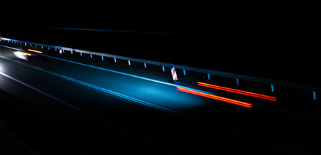 lights of moving cars at night. long exposure