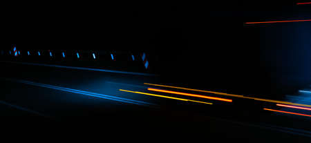 lights of moving cars at night. long exposure