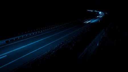 blue car lights at night. long exposure