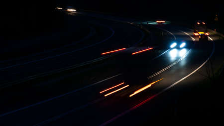 lights of moving cars at night. long exposure