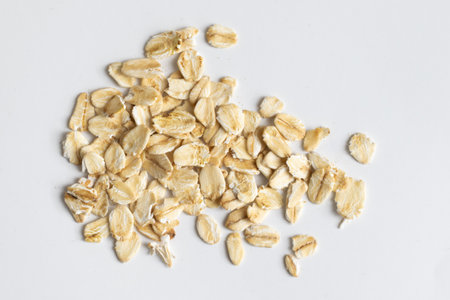 oat flakes on a white isolated background