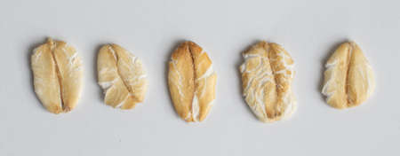 oat flakes on a white isolated backgroundの写真素材