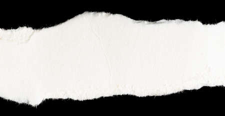 a white piece of paper on a black isolated background