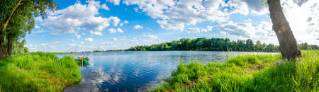lake with interesting sky on a sunny day
