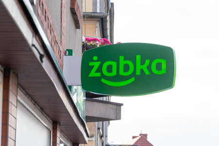Sroda Wielkopolska, Poland - June 25, 2022 - Logo of the zabka store in Sroda Wielkopolskaのeditorial素材