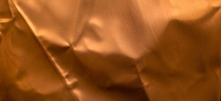 sheet metal painted a copper color. background or texturaの写真素材