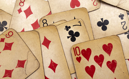 old yellowed poker cards. background or texture