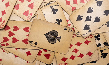 old yellowed poker cards. background or textureの写真素材