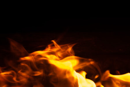 fire flames on black isolated background. texture