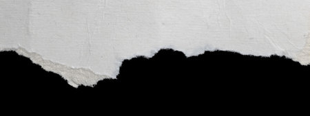 a white piece of paper on a black isolated background
