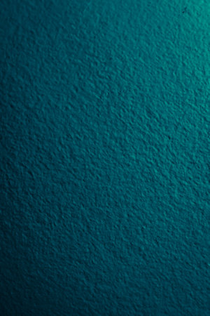 scratched blue metal sheet with visible texture. backgroundの写真素材