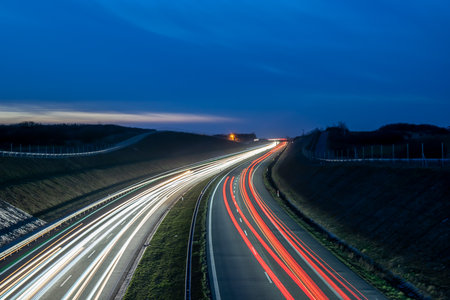 lights of cars driving at night. long exposure