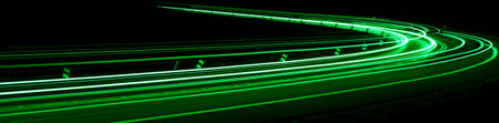 green car lights at night. long exposureの写真素材