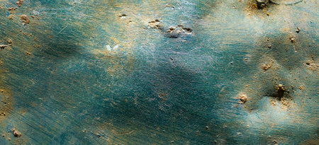 rusting old metal plate painted with green paint