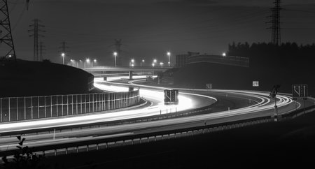 white lines of car lights on black backgroundの写真素材