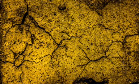 macro photo of gold brick with visible texture. backgroundの写真素材