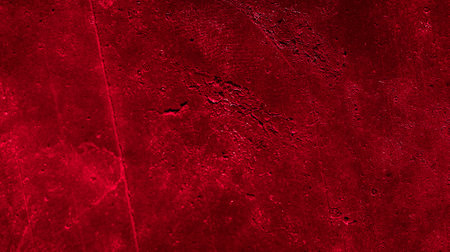 wall painted with red paint with an interesting textureの写真素材