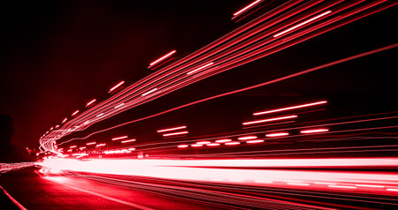 lights of cars driving at night. long exposure