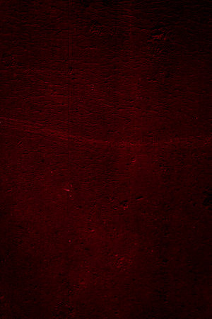 wall painted with red paint with an interesting textureの写真素材