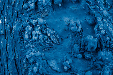 old cracked wood painted blue. background or texture