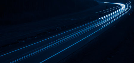 blue car lights at night. long exposure.