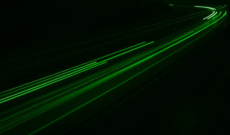 green car lights at night. long exposureの写真素材