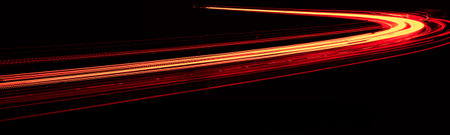 red car lights at night. long exposureの写真素材