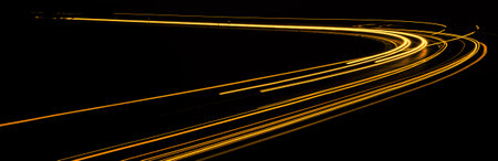 orange car lights at night. long exposureの写真素材