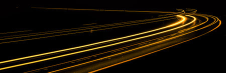 orange car lights at night. long exposureの写真素材