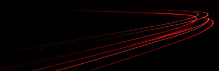 red car lights at night. long exposureの写真素材