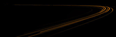 orange car lights at night. long exposureの写真素材