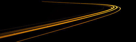 orange car lights at night. long exposureの写真素材