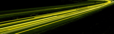 yellow car lights at night. long exposureの写真素材