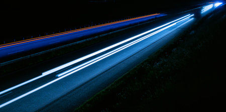 lights of cars driving at night. long exposure