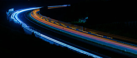 lights of cars driving at night. long exposure