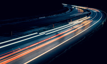 lights of cars driving at night. long exposure