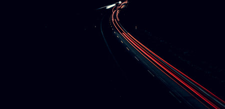 lights of cars driving at night. long exposure