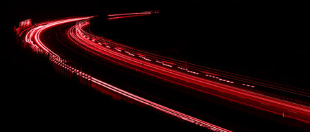 lights of cars driving at night. long exposure