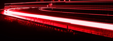 lights of cars driving at night. long exposure