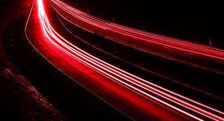 lights of cars driving at night. long exposure