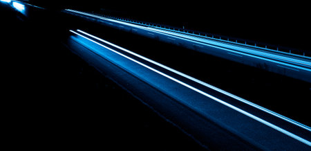blue car lights at night. long exposureの写真素材