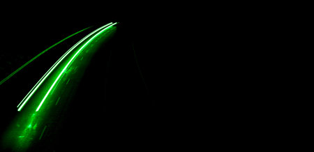green car lights at night. long exposureの写真素材