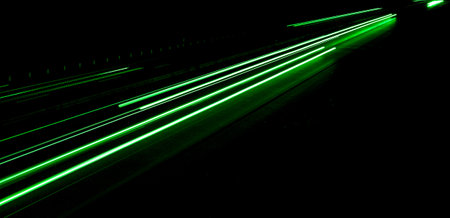 green car lights at night. long exposureの写真素材