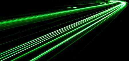 green car lights at night. long exposureの写真素材