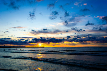 sunset over the Polish sea in Lebaの写真素材