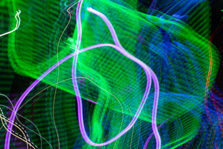 colorful lights on black backgroundの写真素材