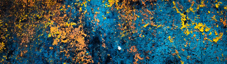 wall painted with colorful old peeling paints