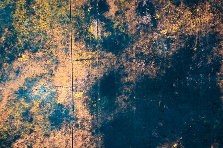 wall painted with colorful old peeling paintsの写真素材