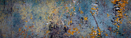 wall painted with colorful old peeling paints