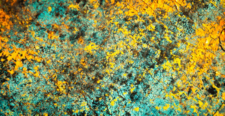 wall painted with colorful old peeling paints